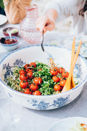 courgette spaghetti and balsamic glazed tomatoes with savoury granola