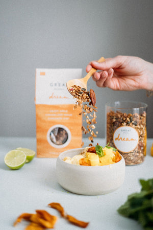 smoothie bowl with mango and granola