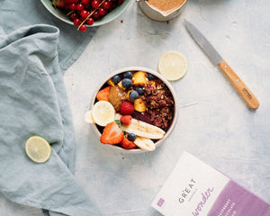 açai bowl with banana, strawberry and chocolate granola